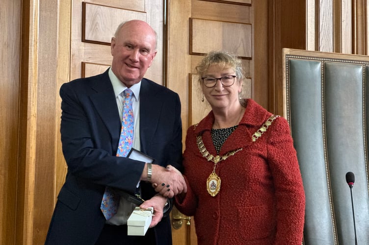 James McInnes served as County Councillor for the Hatherleigh and Chagford Division from 2005 to 2025, pictured with DCC chair, Cllr Caroline Leaver. AQ 4443