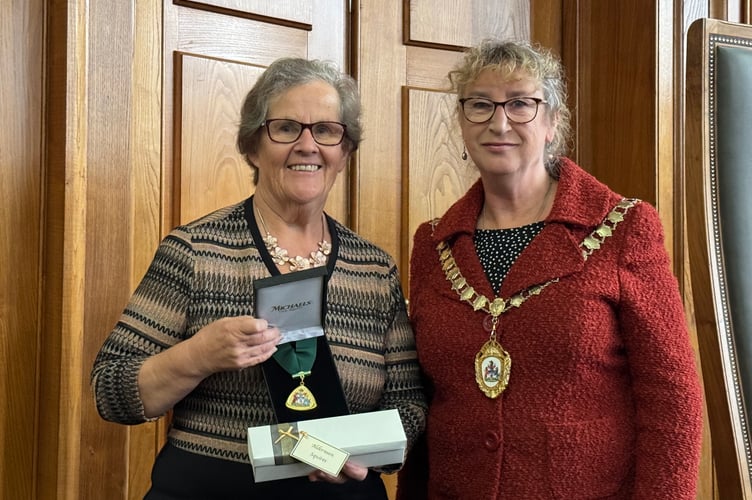 Margaret Squires served as County Councillor for the Creedy, Taw and Mid Devon Exe Division from 2001 to 2005 and 2013 to 2025. AQ 4456