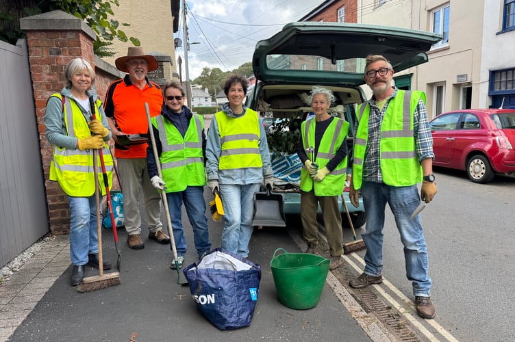 Some of the volunteers who took part in the last Crediton Urban Taskforce action event in East Street, with Cllr Huxtable, second left and Cllr Rachel Backhouse, fifth left. AQ 2785
