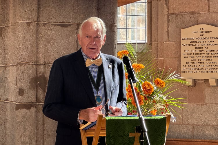 Crediton Town Band President Paul Evans was MC for the concert. AQ 5254