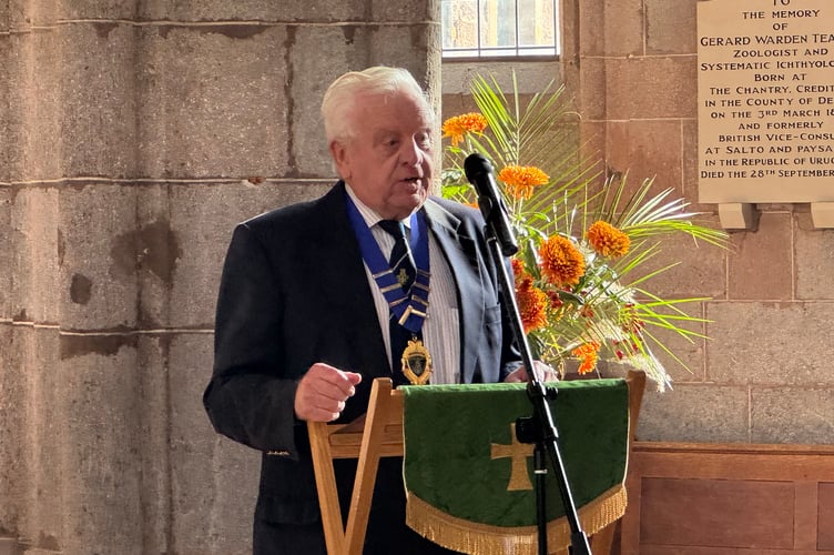 Ray Kingdom, Chairman, SW Brass Band Association, paid tribute to former Crediton Town Band Musical Director Chris Richards. AQ 5272