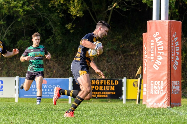 Josh Goldman dashing for the try-line