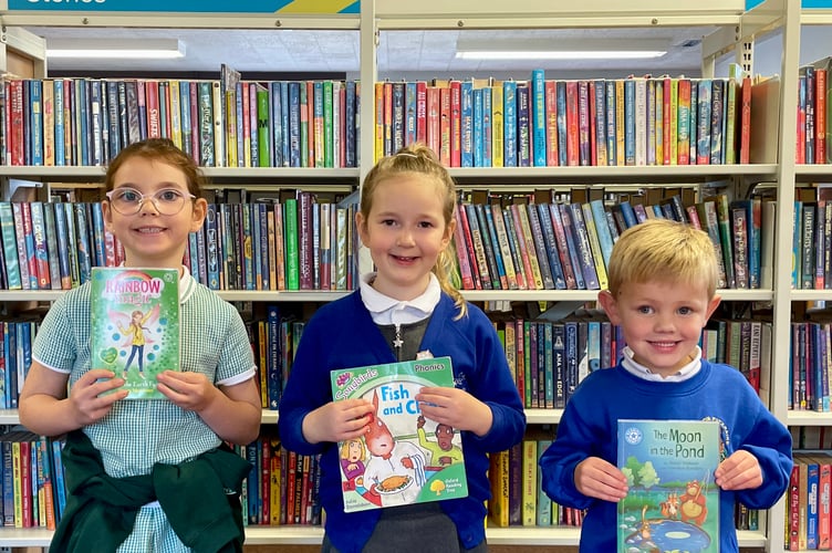 From left, Adaline, Violet and Tor at Crediton Library