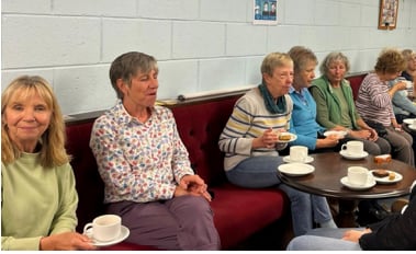 Tedburn St Mary WI members enjoy refreshments after skittles with Alphington WI.
