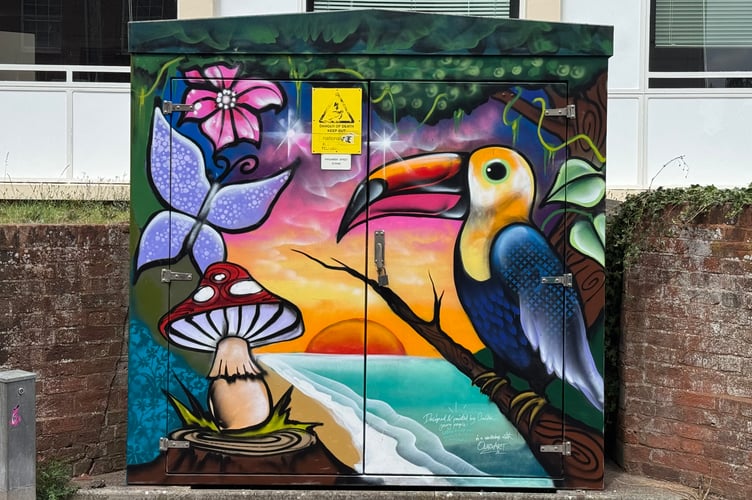 The colourful National Grid cabinet in Parliament Street, Crediton.  AQ 7455
