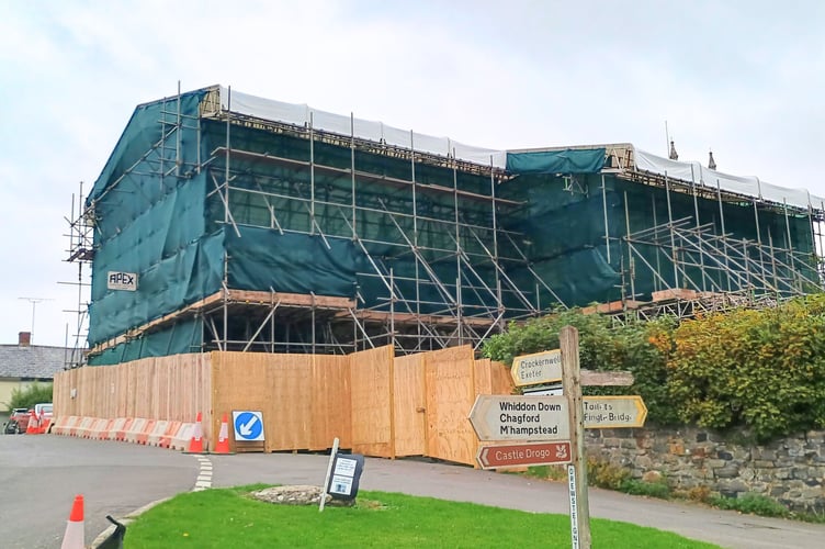 Scaffolding covering the thatched cottages at Drewsteignton