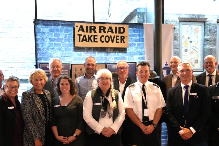 A group of people at the Museum of Policing in Devon and Cornwall.