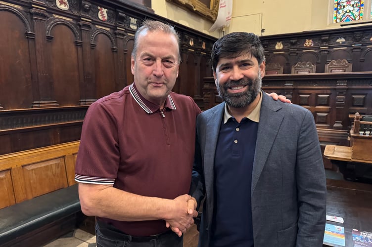 Cllr Phil Bialyk, Leader, Exeter City Council, left and Fasihullah Hakim, Inclusive Exeter director, at the recent Against Racial Abuse meeting. AQ 5920