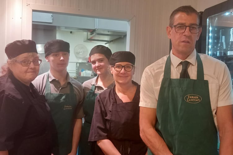 Stuart Luxton, right, and some of the staff from Farmer Luxton’s.