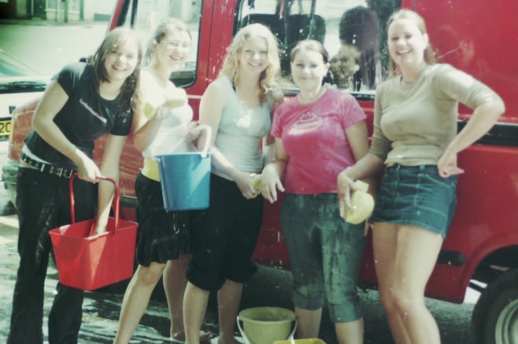 Year 10 students at QECC washed cars to raise funds for WaterAid in July 2004. DSC01387