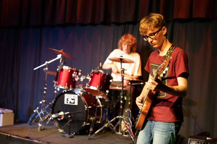 Some of the members of Burnt Daylight on stage.
