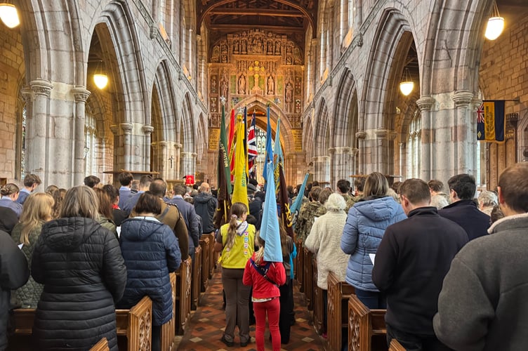 Crediton Parish Church was full for the Remembrance Service. AQ 7526