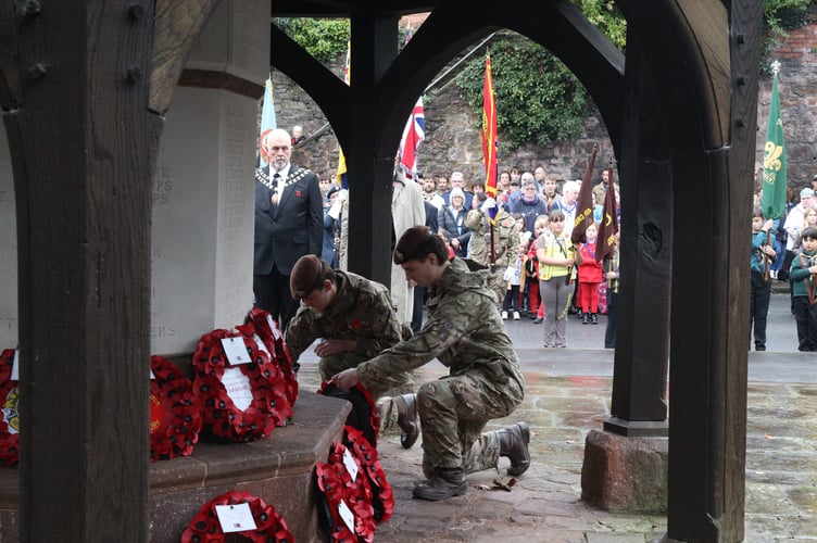 Army cadets laying wreaths at the war memorial