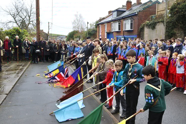 Dipping standards as a mark of respect at the war memorial
