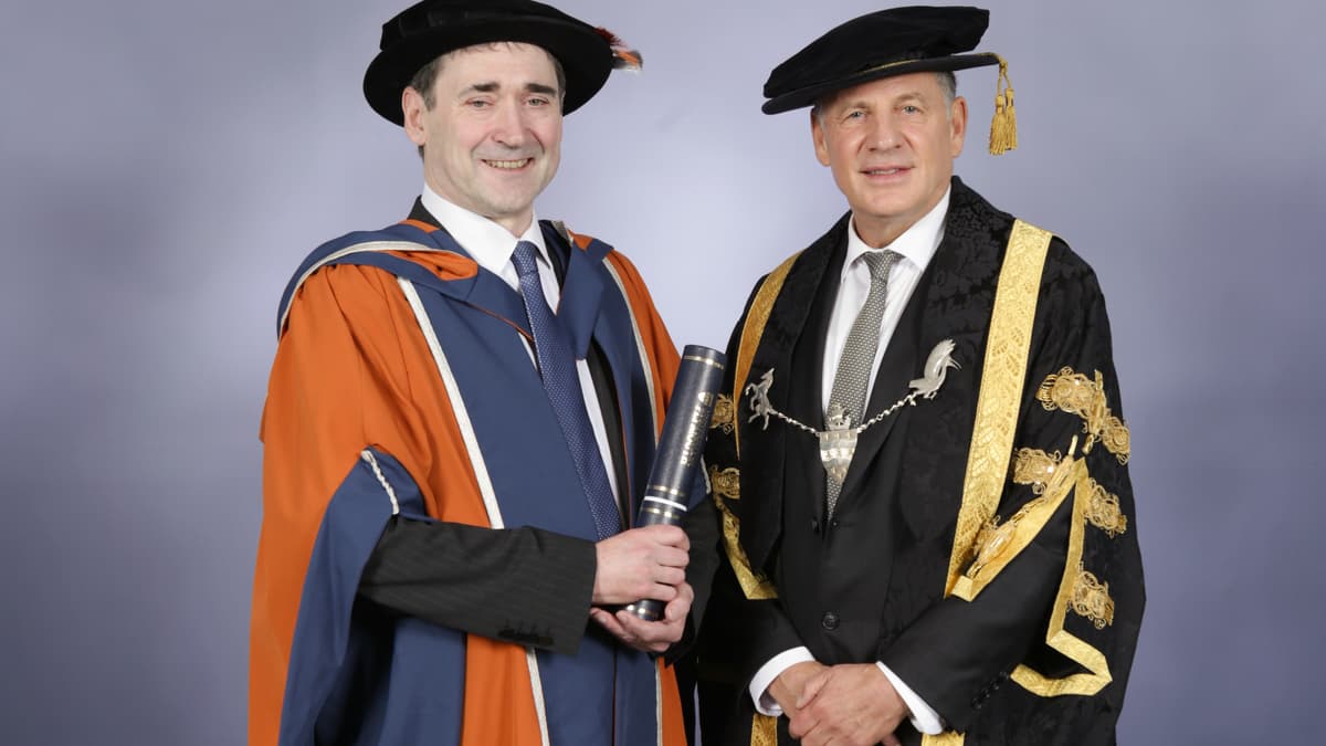 Business leader Alastair receives honorary doctorate