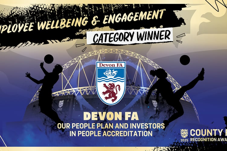 The winner board announcement about the Devon FA win.
