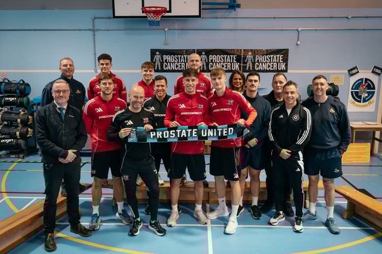 Staff and players from Exeter City Football Club and officers from HMP Exeter joined forces to raise funds for Prostate Cancer UK.
