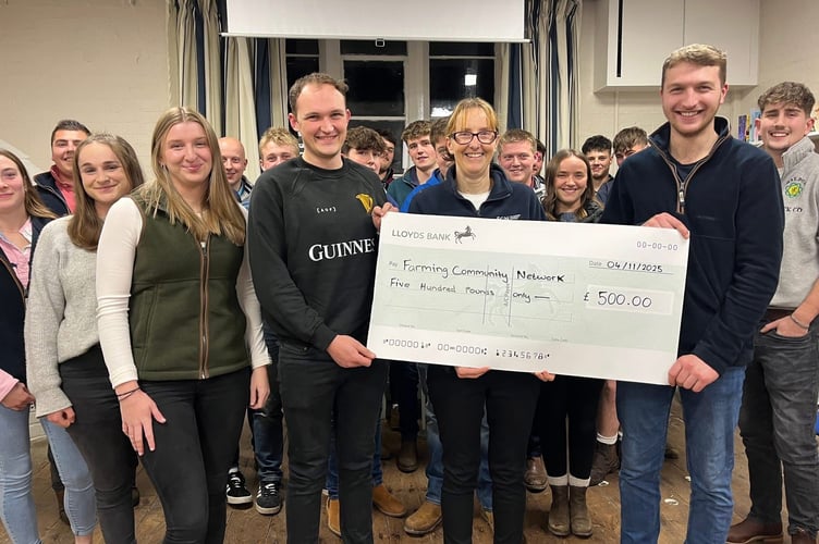 Bow YFC members present their £500 donation to Jo Jones for The Farming Community Network.
