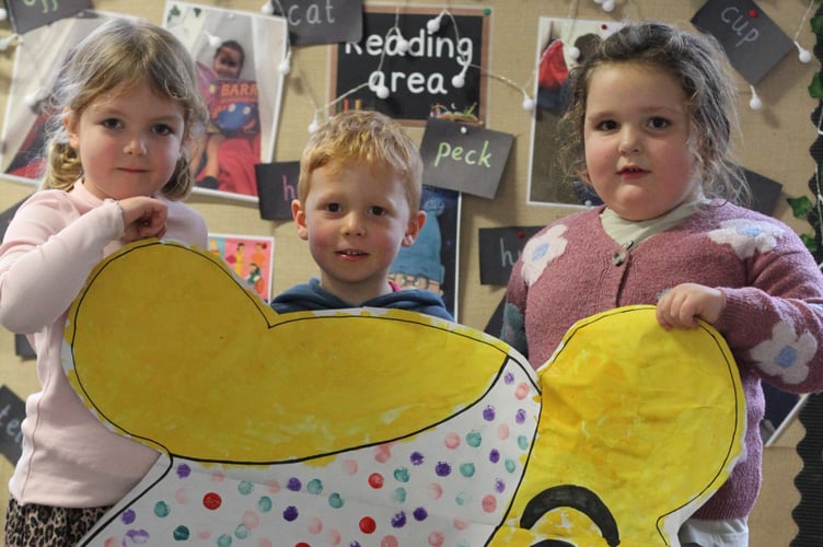 Children in the early years painted a big cut-out of Pudsey Bear