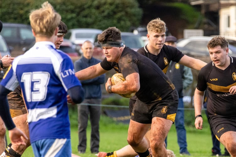 Flanker Josh Burnison breaking a tackle