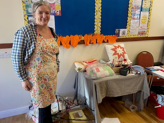 Claire Borlase with her Friends of the Surgery stall.