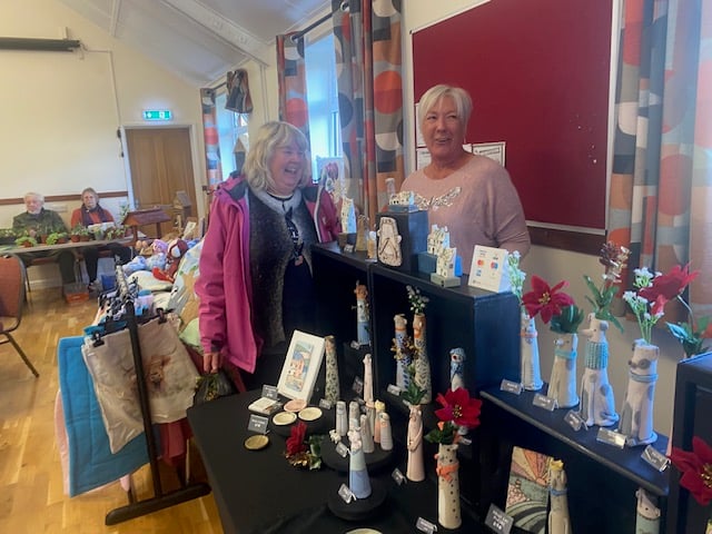 Jeannine Rundle on her ceramics stall with Joan Jenner.