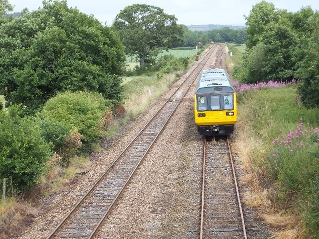A train on the Tarka Line at Folly Bridge.
