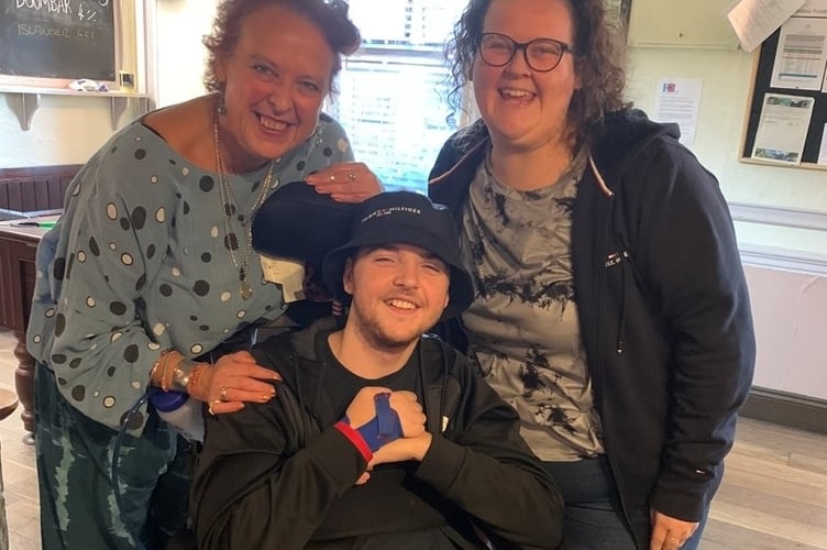 Seth Marks and his family mum Julie and XX