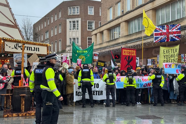 Exeter is for Everyone campaigners lined up to greet the British Unity Walk. AQ 8766