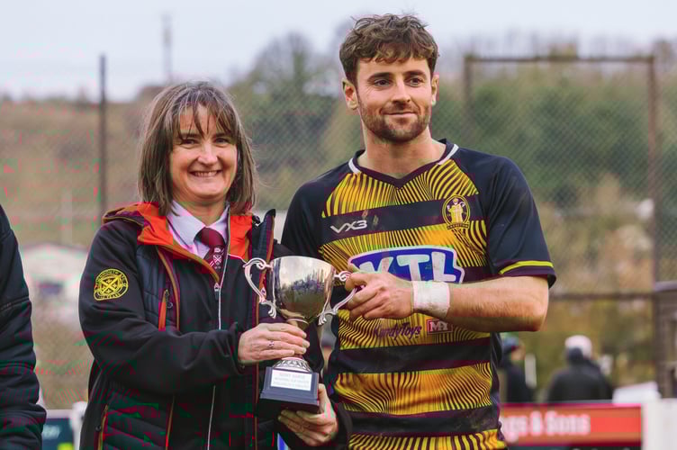 Ollie Avery-Wright with Geoff Warne Memorial Trophy