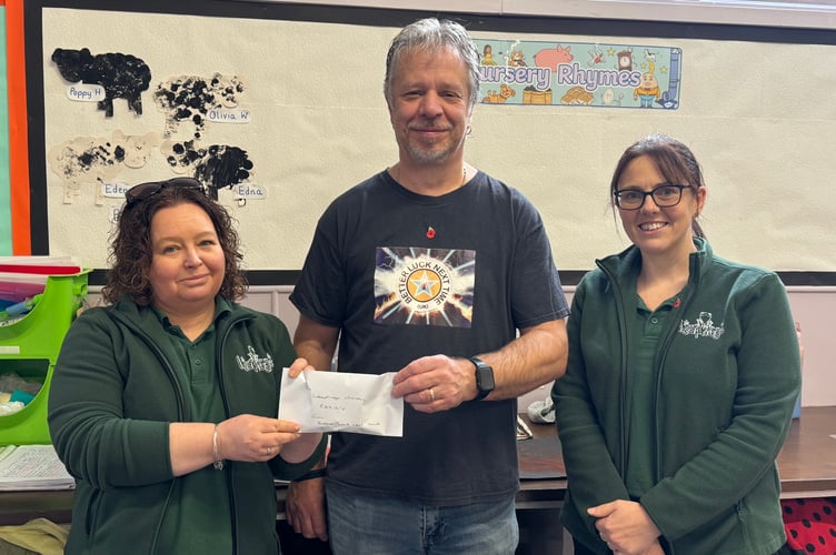 Ian Chattington, from Better Luck Next Time, centre, makes the donation to Emma Cavanagh, left and Jenna Rich, for Leapfrogs Nursery.  AQ 7686
