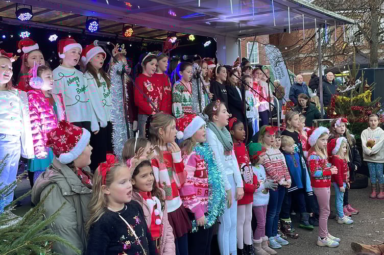 29 November 2025 Christmas lights switch-on Landscore Primary School pupils sang festive tunes (Will Goddard, Crediton Courier)