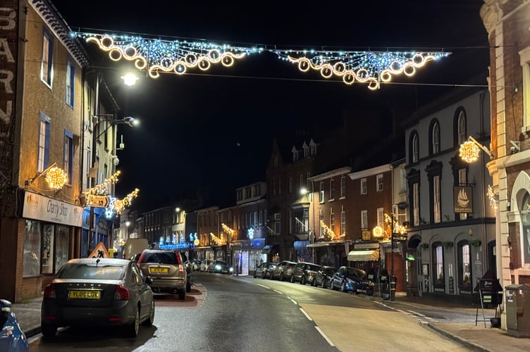 Christmas lights are up in Crediton High Street ready for Late Night Shopping this Friday. AQ 9738