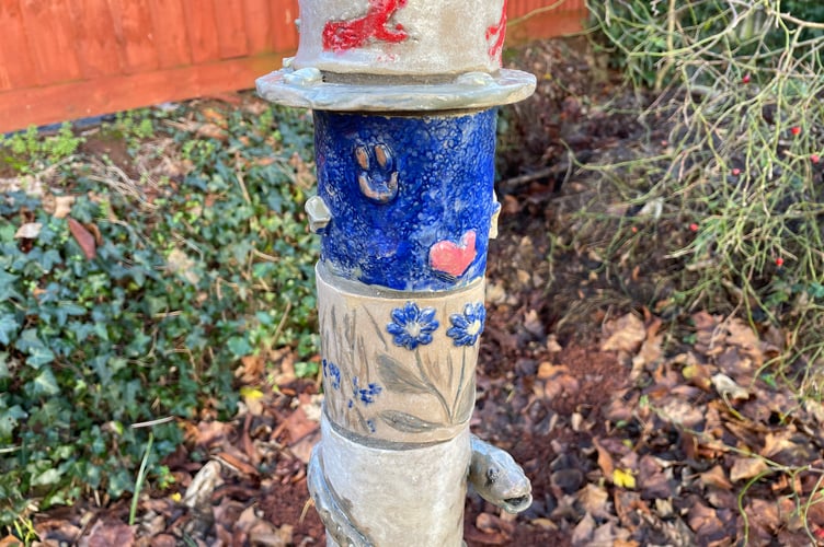 Some of the designs on the totem pole