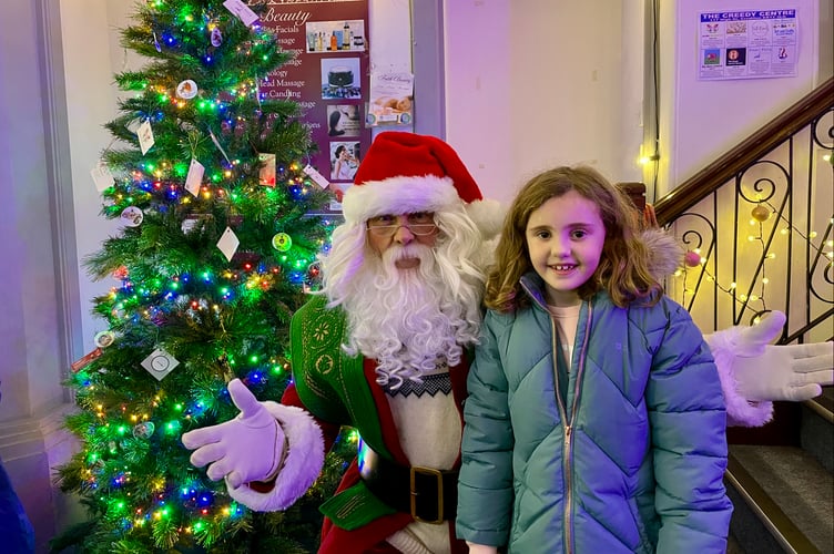 This youngster enjoyed meeting Santa Claus