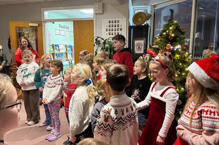 Bow School Choir sang at the School’s Christmas Fair. AQ 9982