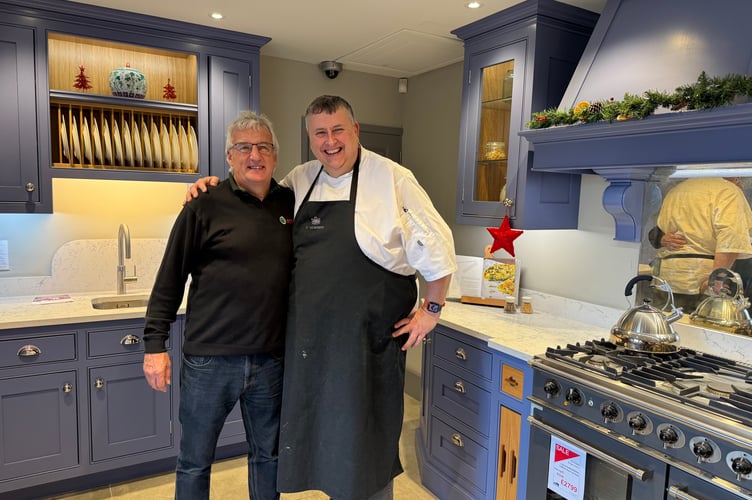 Chef, Richard Hunt, right, created fantastic festive tasters whilst demonstrating the capabilities of appliances and cooking innovation at Ashgrove Kitchens Winter Warmer event, pictured with Managing Director Paul Brimblecombe. AQ 0107
