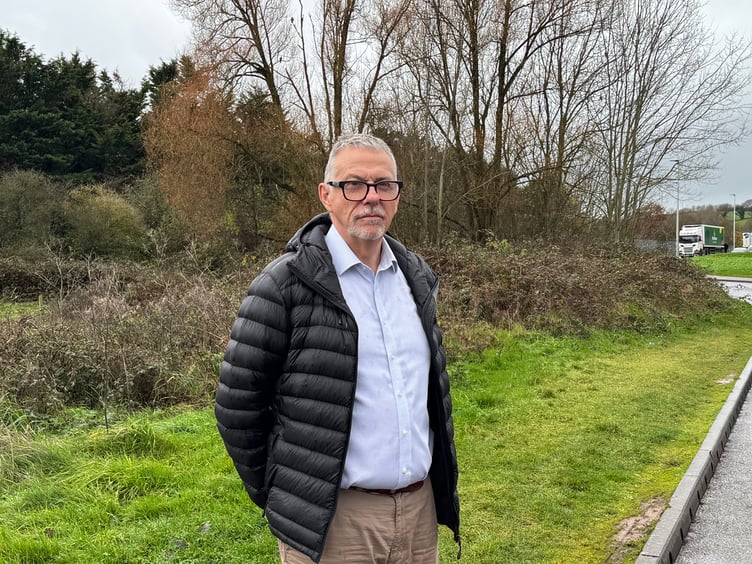 Councillor John Downes who has been actively pursuing a bus shelter opposite Redlands Surgery in Joseph Locke Way, pictured in February. AQ 0239