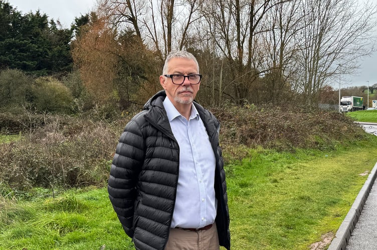Councillor John Downes who has been actively pursuing a bus shelter opposite Redlands Surgery in Joseph Locke Way. AQ 0239