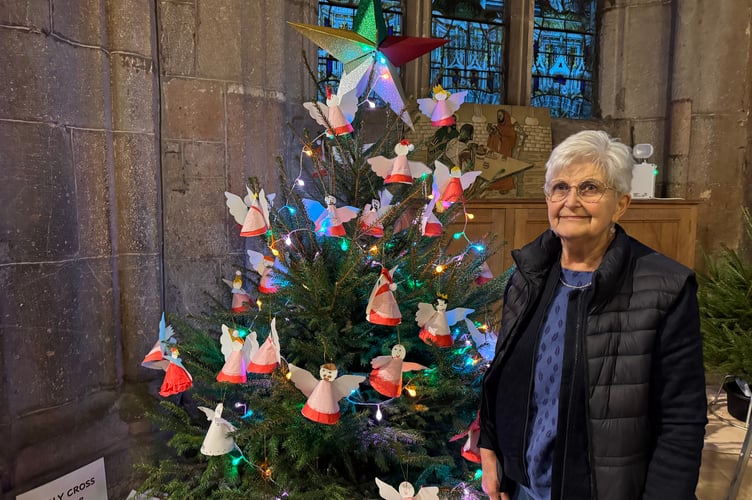 The Holy Cross Junior Choristers tree featured angels made by the choristers.  AQ 9599
