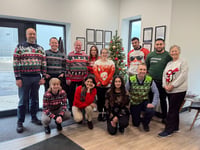 Christmas jumpers worn by Crediton Dairy staff for Save the Children

