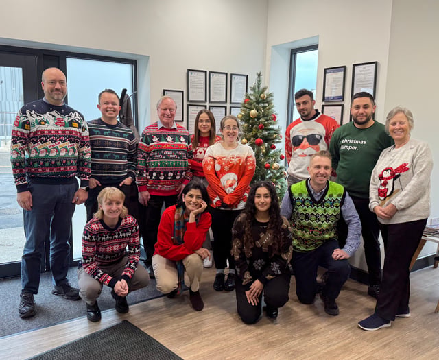 Christmas jumpers worn by Crediton Dairy staff for Save the Children
