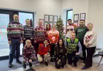 Christmas jumpers worn by Crediton Dairy staff for Save the Children