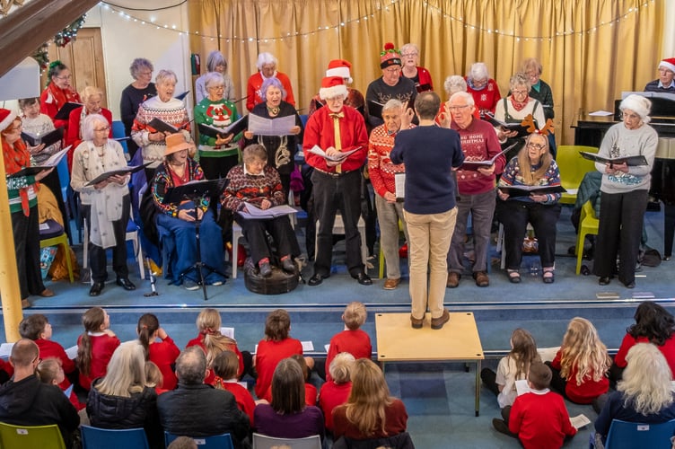 Mid Devon Good Afternoon Choir in concert with children from Haywards School.