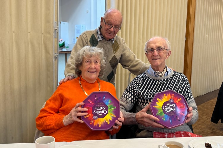 Husband and wife, Brian and Maureen Boatfield, 94 and 93 respectively, were the oldest guests, who received a box of chocolates each from Rotarian Richard Carey. AQ 0544