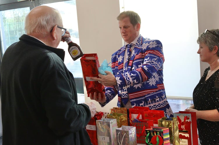 12 December 2025 The bottle dip at the Newton St Cyres Christmas fair (Will Goddard, Crediton Courier)