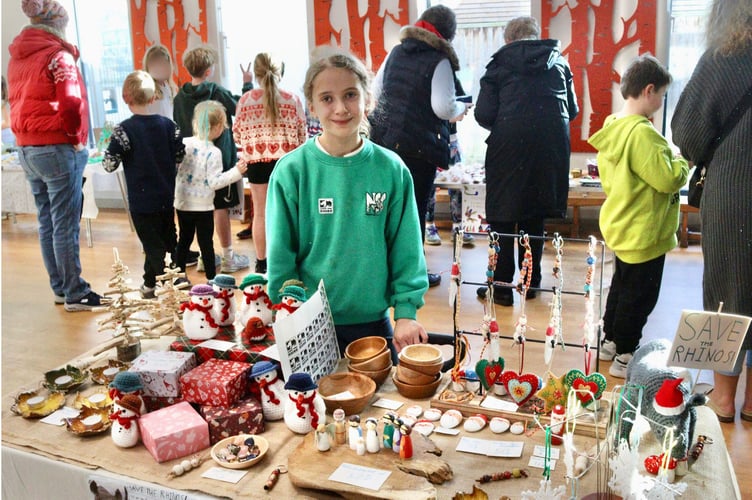 Clara, 10, ran the charity Save the Rhino stall selling crafts she and friends had made at the Newton St Cyres Christmas fair