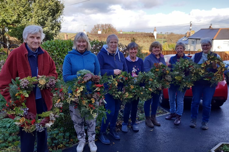  Tedburn St Mary WI members have been busy making decorative Christmas wreaths and Christmas chocolates.
