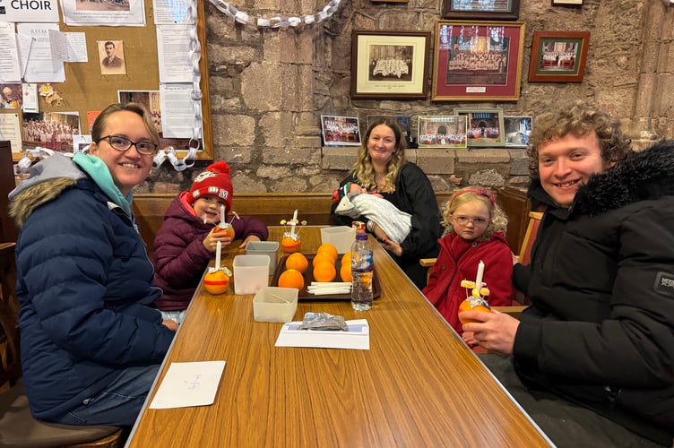 Christingles made ready for the Crediton Parish Church service.  AQ 0628
