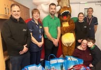 Racecourse mascot delivers Christmas joy to Bramble Ward